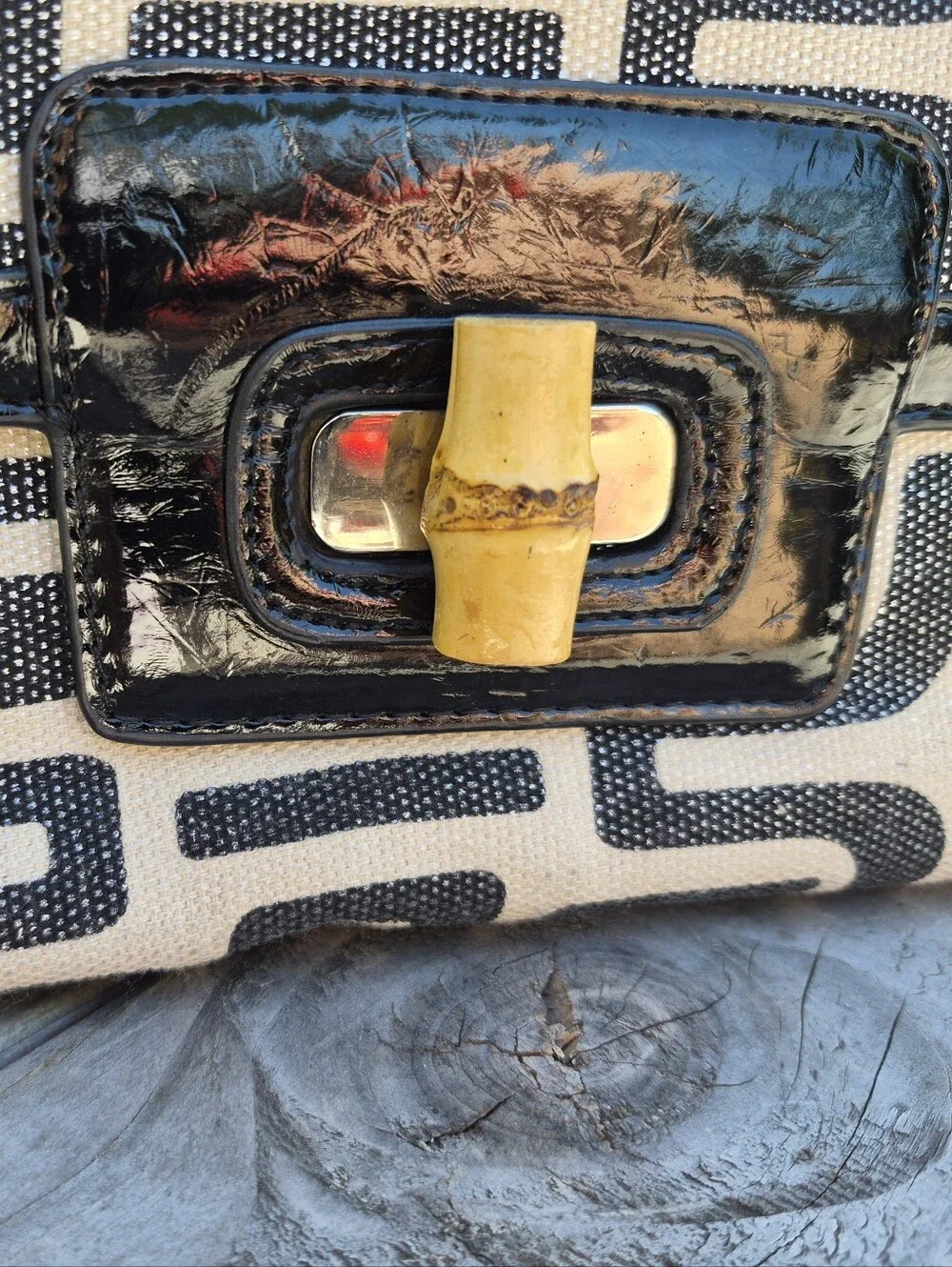 Sondra Roberts Black and Cream Geometric Canvas Clutch with Bamboo Accent